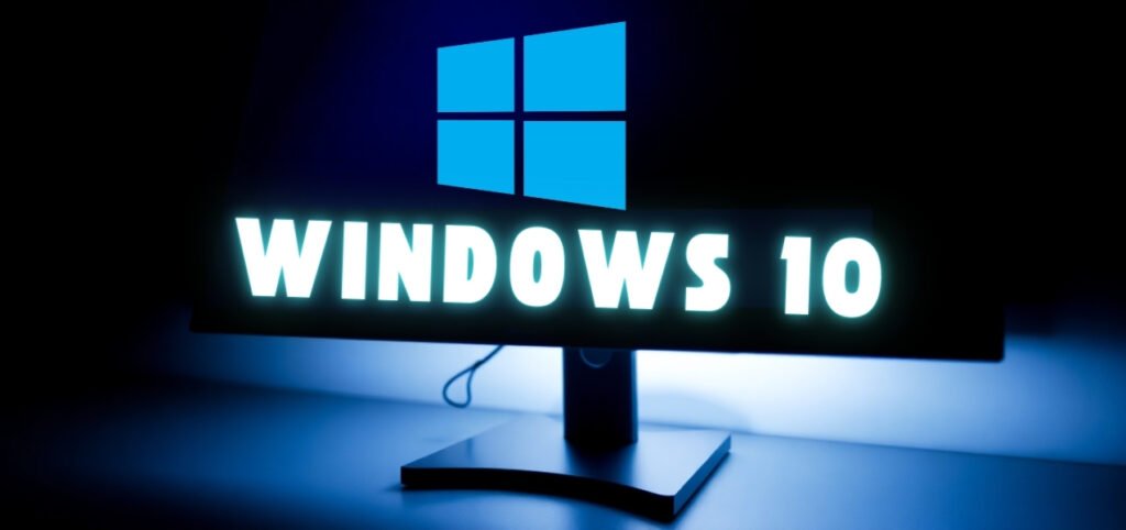 Computer monitor displaying "Windows 10" logo with blue backlight.