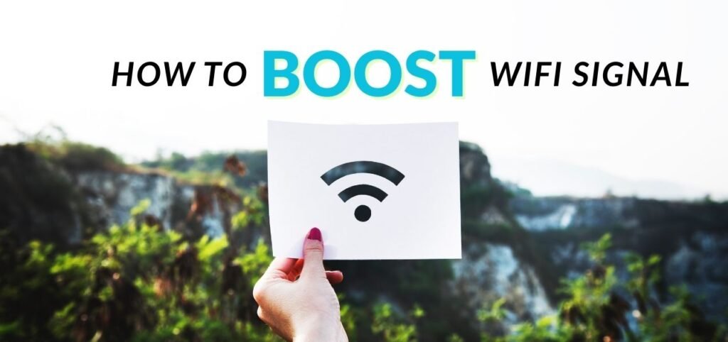 A hand holds a paper with a WiFi symbol against a blurred outdoor background. Text above reads, "How to Boost WiFi Signal.